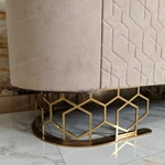 Luxury TV Stand with Textured Upholstered Panels Geometric Stainless Steel Base and Spacious Cabinet Storage